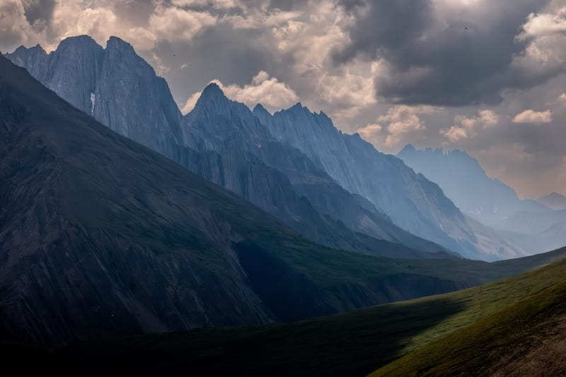 When I climb a mountain, other mountains call out to me from far in the distance.  Always in the same place, yet always looking different